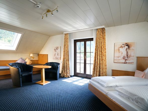 Doppelzimmer "Family" im Dachgeschoss mit Balkon