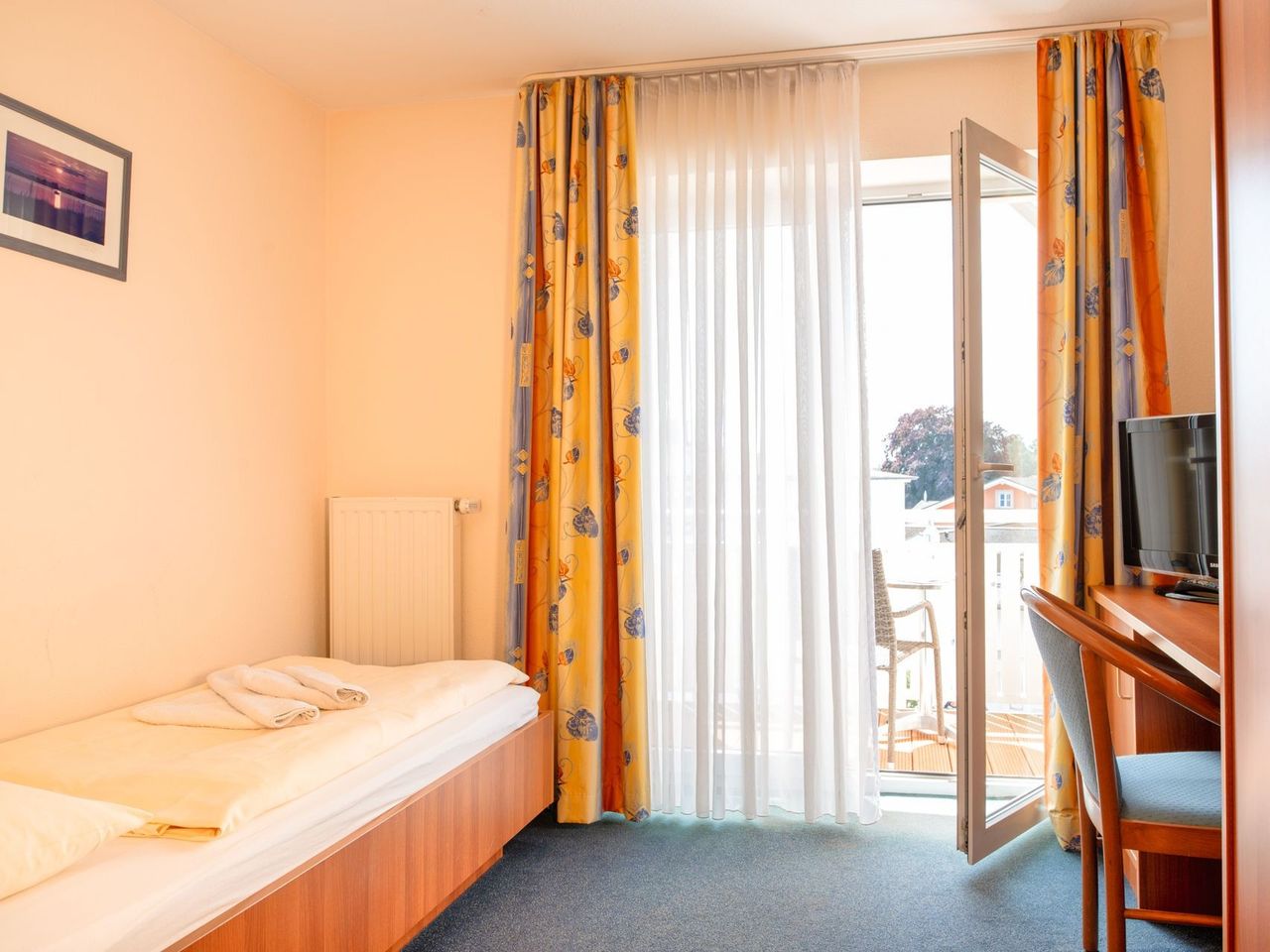 Einzelzimmer mit Balkon