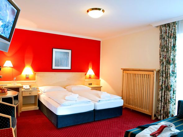 Dreibettzimmer mit Balkon