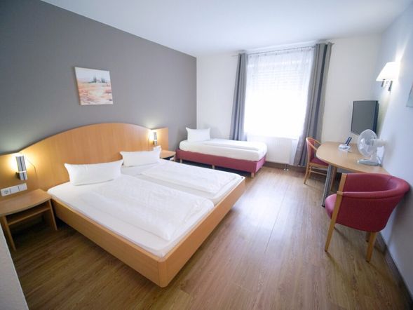 Dreibettzimmer