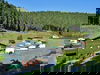 Waldbaden in Thüringen: Feriendorf Idylle & Fasssauna