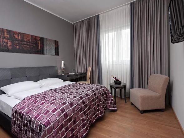 Dreibettzimmer DELUXE