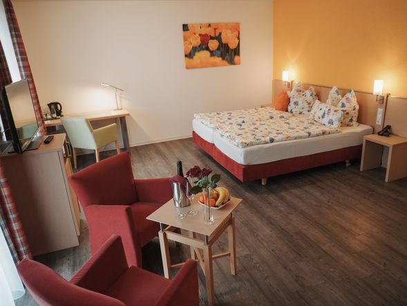 Doppelzimmer Deluxe mit Balkon