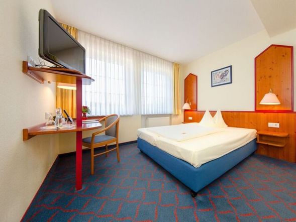 Dreibettzimmer