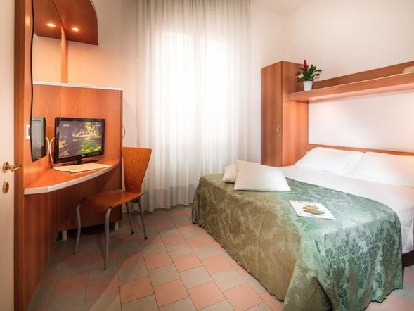 Dreibettzimmer mit Balkon