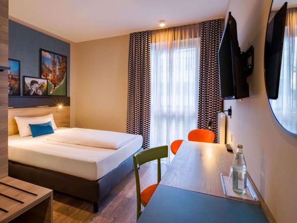 Einzelzimmer mit Queensize-Bett