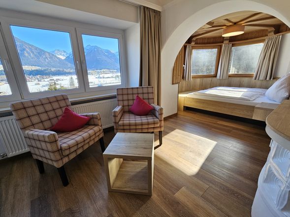 Apartment mit rundem Doppelbett