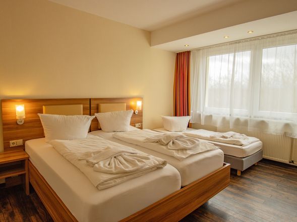 Dreibettzimmer