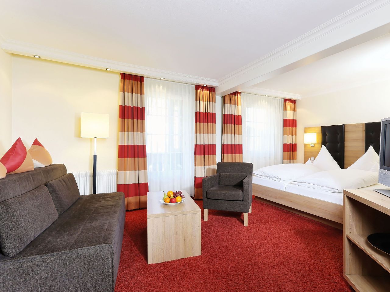 Dreibettzimmer mit Balkon