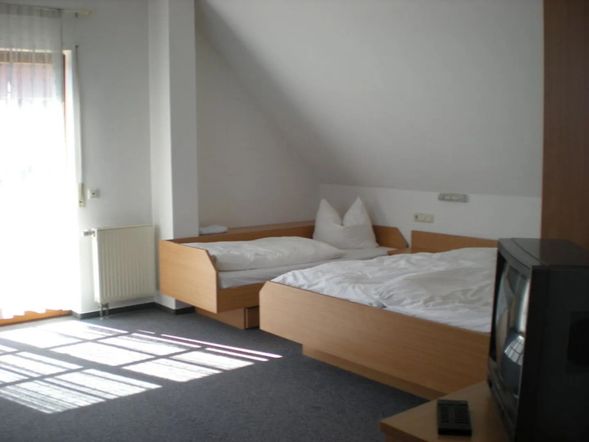 Dreibettzimmer