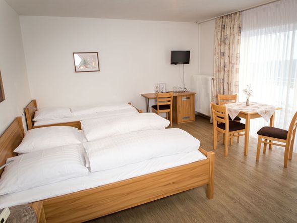 Dreibettzimmer