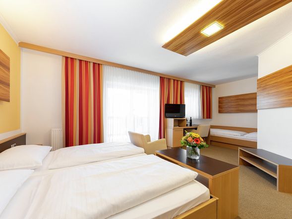Dreibettzimmer Komfort mit Balkon im Trattnerhof