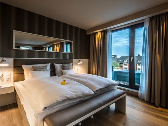 Doppelzimmer mit Balkon im Haus der Ideen
